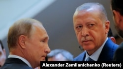 Vladimir Putin (solda) və Receb Tayyib Ərdoğan