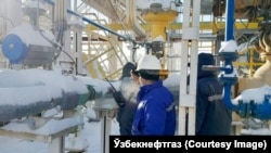 Работники "Ўзбекнефтгаз". Иллюстративное фото