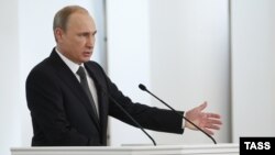 Президент России Владимир Путин во время выступления с ежегодным посланием к Федеральному собранию