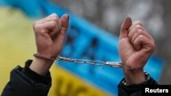 Участник акции протеста возле Администрации президента Украины. Киев, 17 января