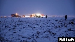 На месте падения Ан-148 в Раменском районе, вечер, 11 февраля 2018