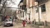 Kazakhstan – Children are playling near old buildings on Taken Alimkulov street in Shymkent city. 12 March 2021 